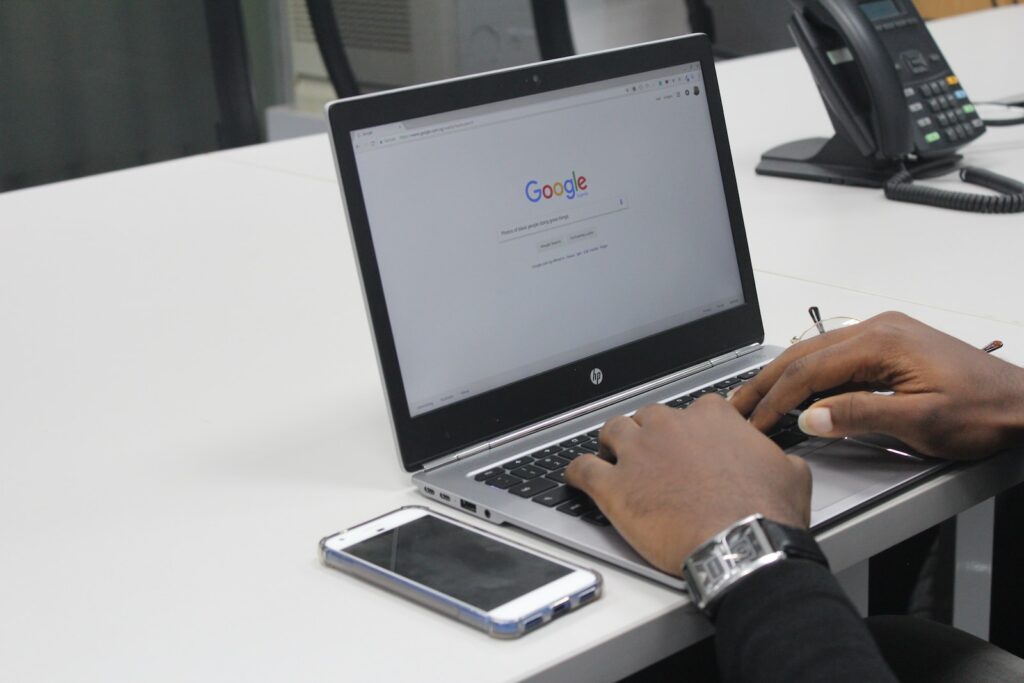 person typing on gray and black HP laptop
How to rank higher on google